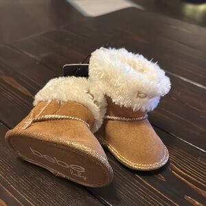 Bebe Tan and White Plush Lined Boots